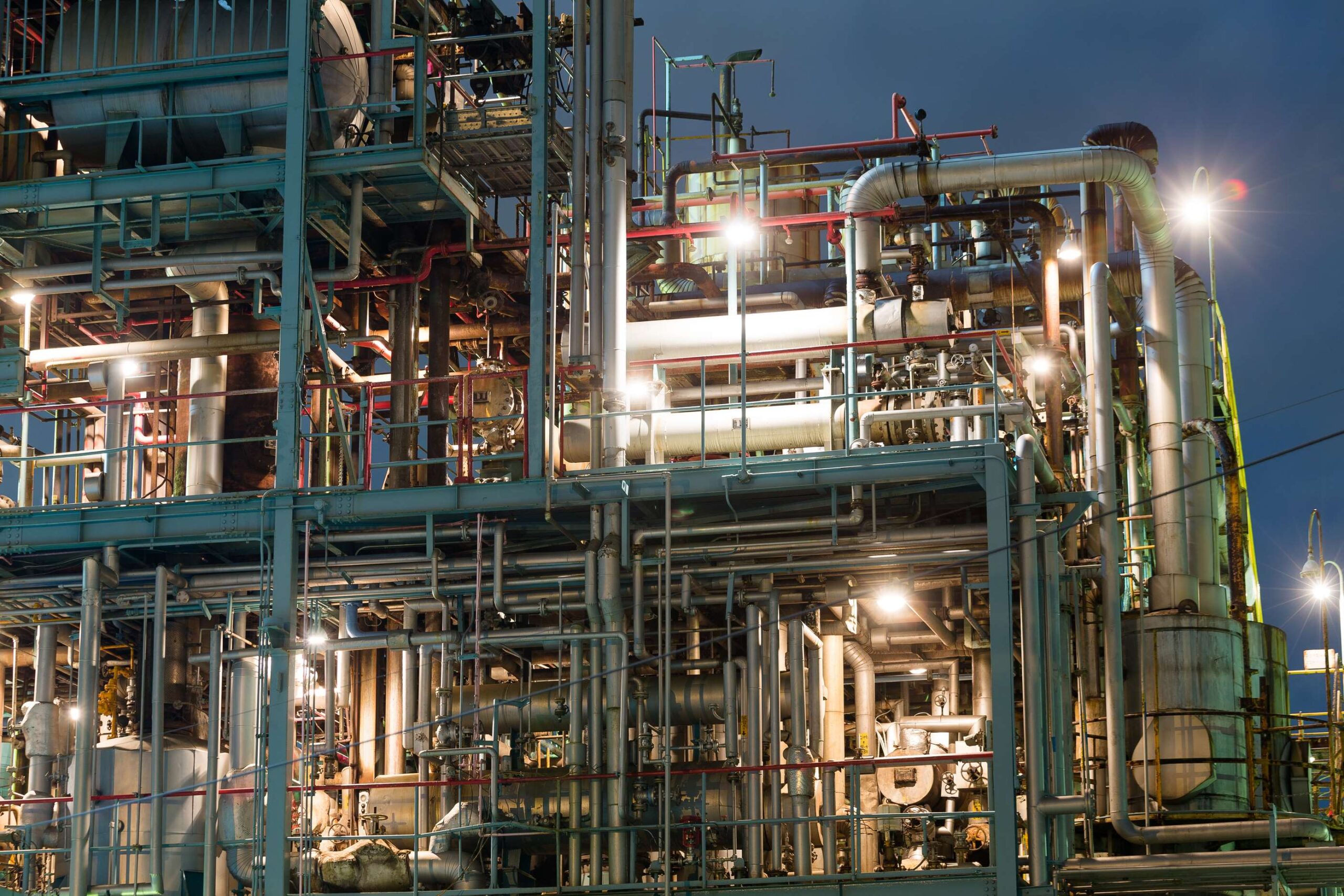 //bowsherps.com/wp-content/uploads/2023/03/oil-and-gas-industry-at-night-2022-12-15-22-45-27-utc-1-Copy-scaled.jpg